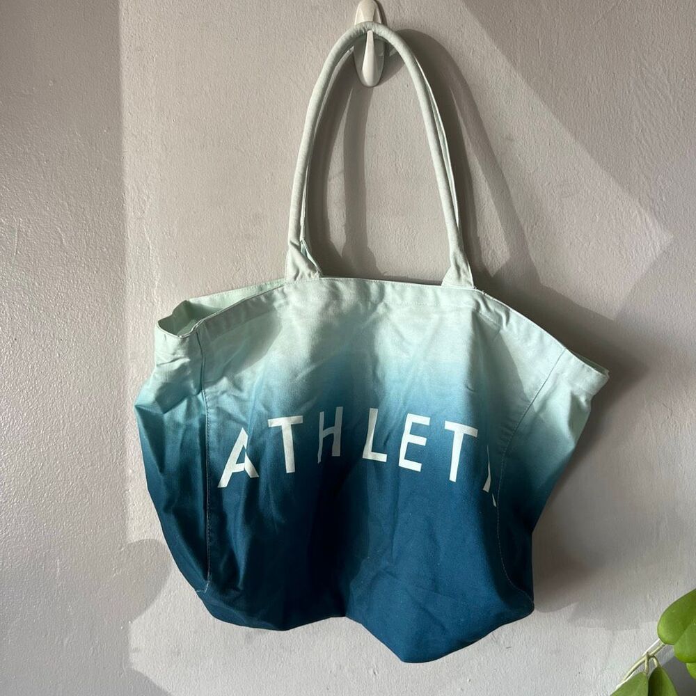 Athleta cotton canvas tote bag featuring a blue-to-light-blue ombre gradient and